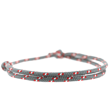 Graues Komimar Surfer Armband in einen schönen Muster